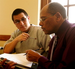 Students working with professor